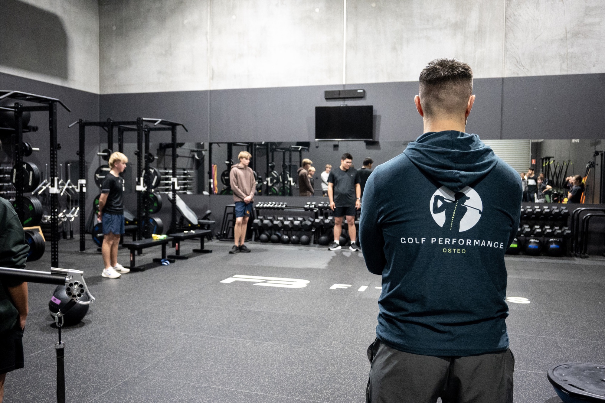 The large Golfers Hub strength and conditioning floor during an athlete development session