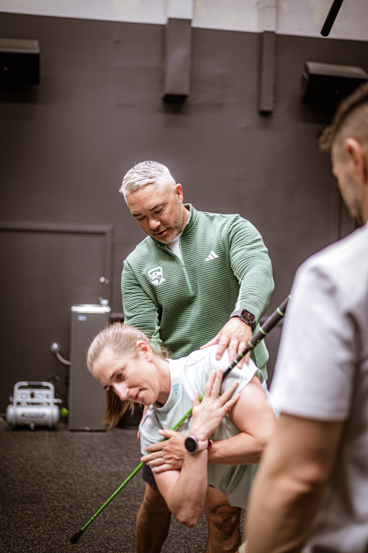 Adam Weeks and Jon Zuccala collaborating during a golfer performance session